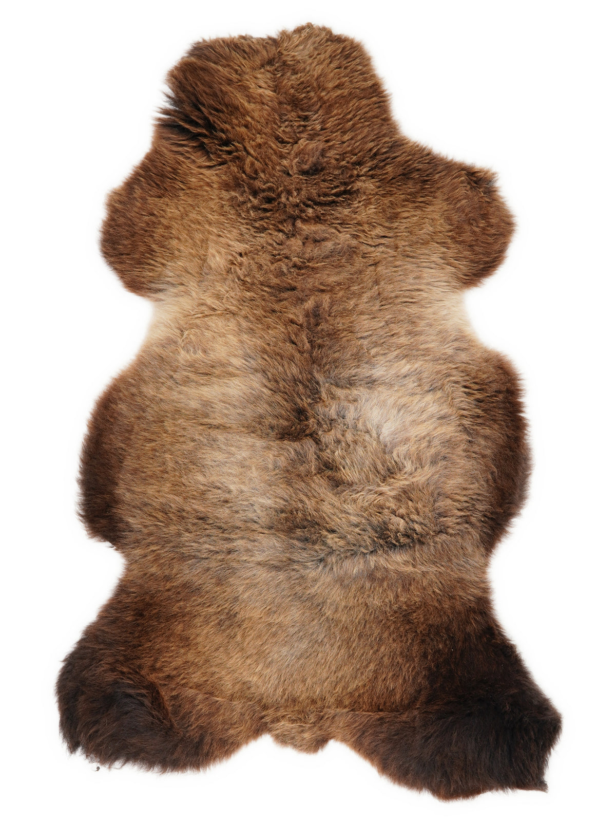 Peau de mouton marron d’environ 115 × 50 cm, vue de dessus : exactement la peau que vous recevez