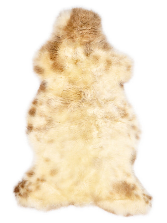 Peau de mouton multicolore britannique d’environ 110 × 60 cm, vue de dessus : exactement la peau que vous recevez