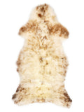 Peau de mouton multicolore britannique d’environ 115 × 55 cm, vue de dessus : exactement la peau que vous recevez