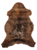 Peau de mouton marron d’environ 100 × 65 cm, vue de dessus : exactement la peau que vous recevez