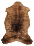 Peau de mouton marron d’environ 105 × 60 cm, vue de dessus : exactement la peau que vous recevez