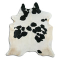 Peau de vache noire et blanche XL