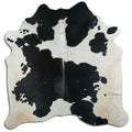 Peau de vache noire et blanche XL