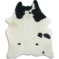 Peau de vache noire et blanche L