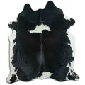 Peau de vache noire et blanche XL