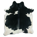Peau de vache noire et blanche XL