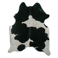Peau de vache noire et blanche M