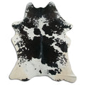 Peau de vache noire et blanche XL