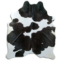 Peau de vache noire et blanche XL